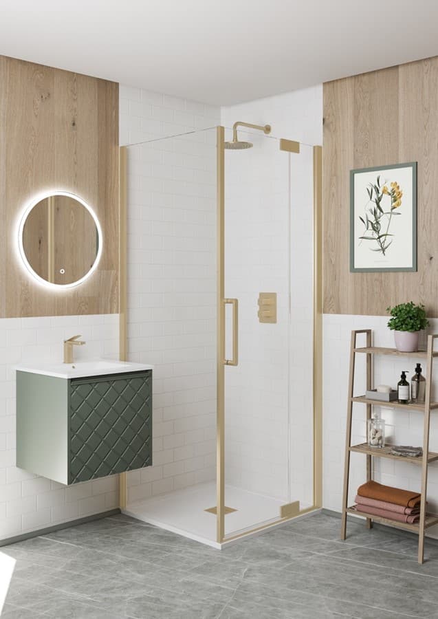 Green wall-mounted vanity beside a glass shower enclosure with wood-effect wall surfaces.