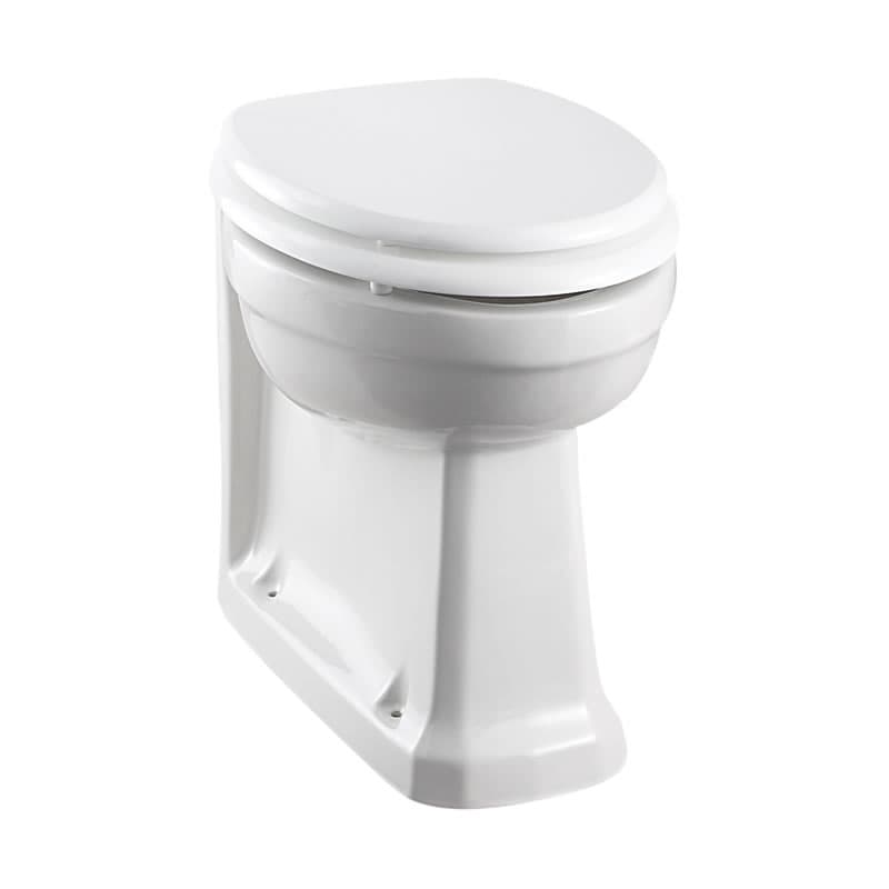 Traditional white back-to-wall toilet pan with a moulded pedestal base