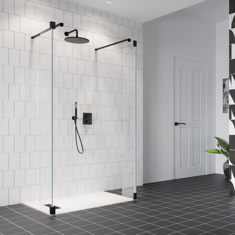 Black-braced walk-through shower panels with short hinged returns in a pale tiled room